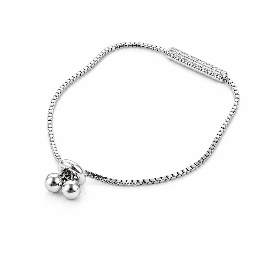 Side view of 925 silver box chain bolo bracelet with pavé cubic zirconia bar and adjustable slider balls
