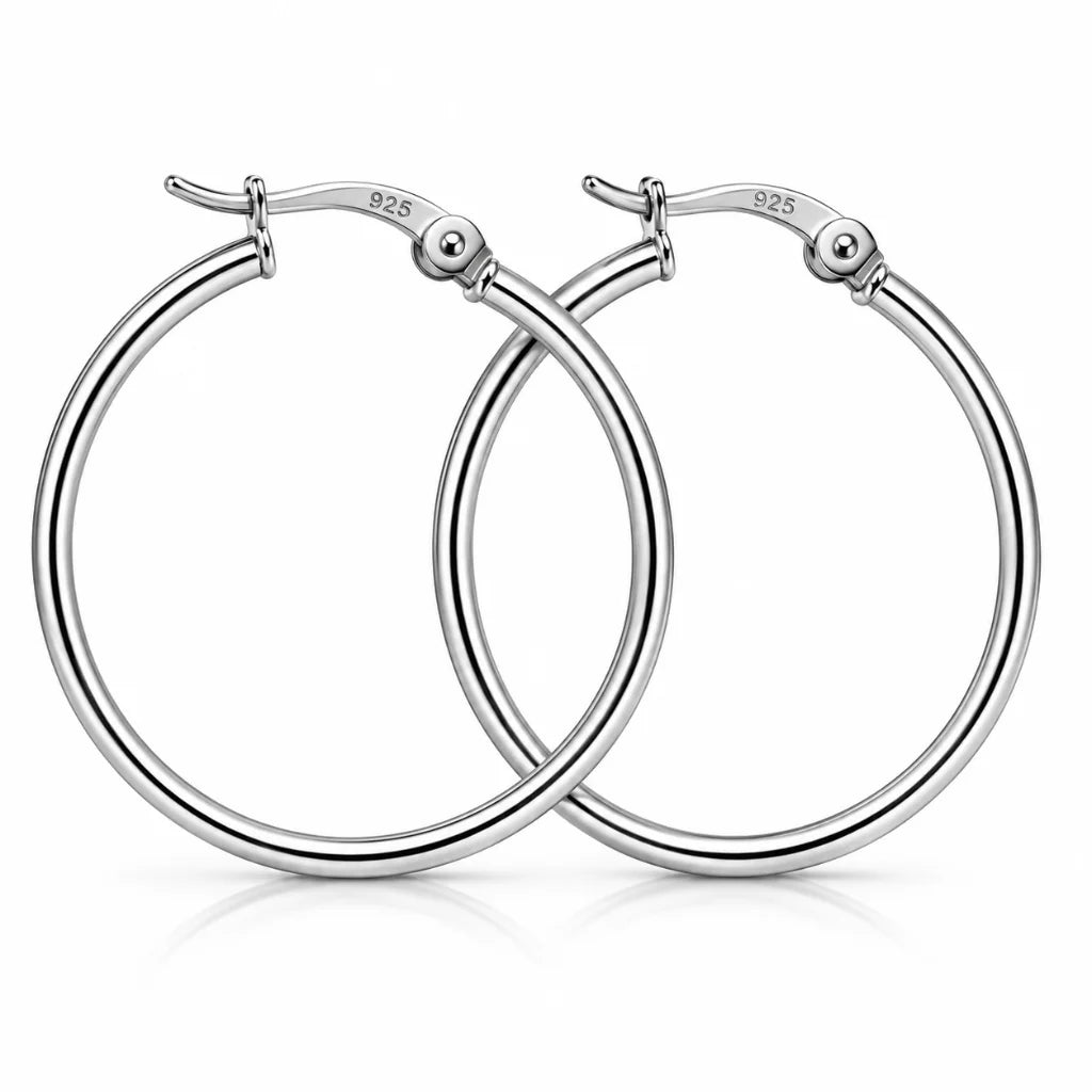 925 sterling silver hoop earrings with polished finish and secure hinged clasp on a white background.