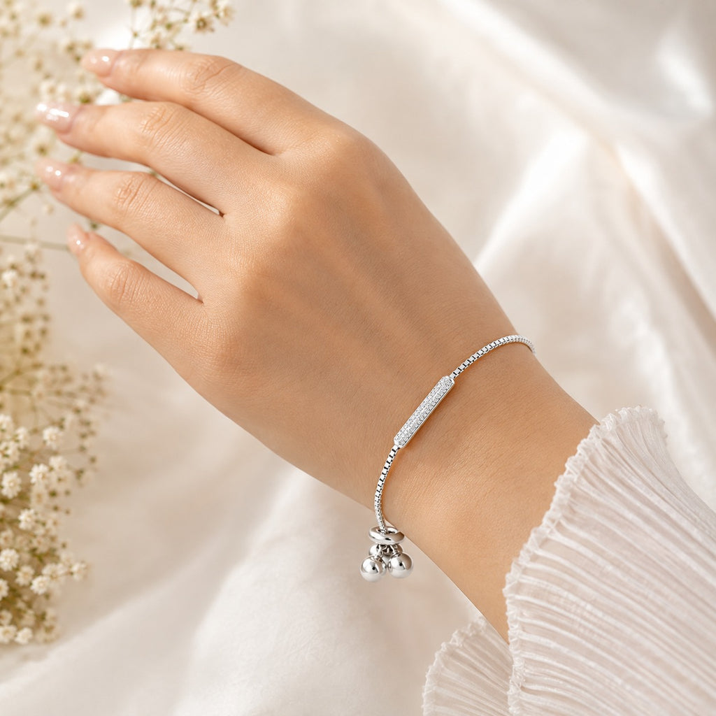 Close-up of 925 sterling silver bracelet featuring a sparkling crystal bar