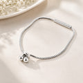 925 sterling silver bracelet for women with sparkling bar and polished ball charms