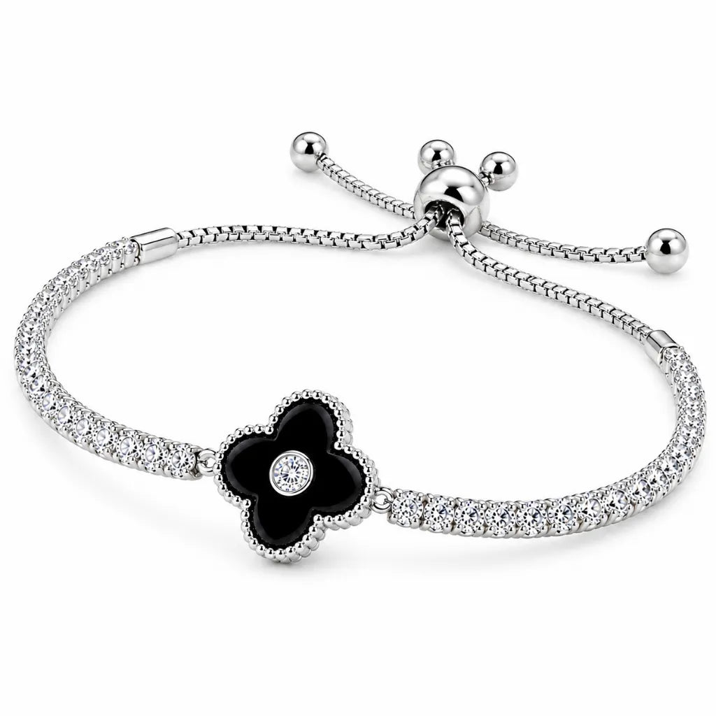 Side view of 925 sterling silver clover bracelet with black onyx center and sparkling cubic zirconia stones