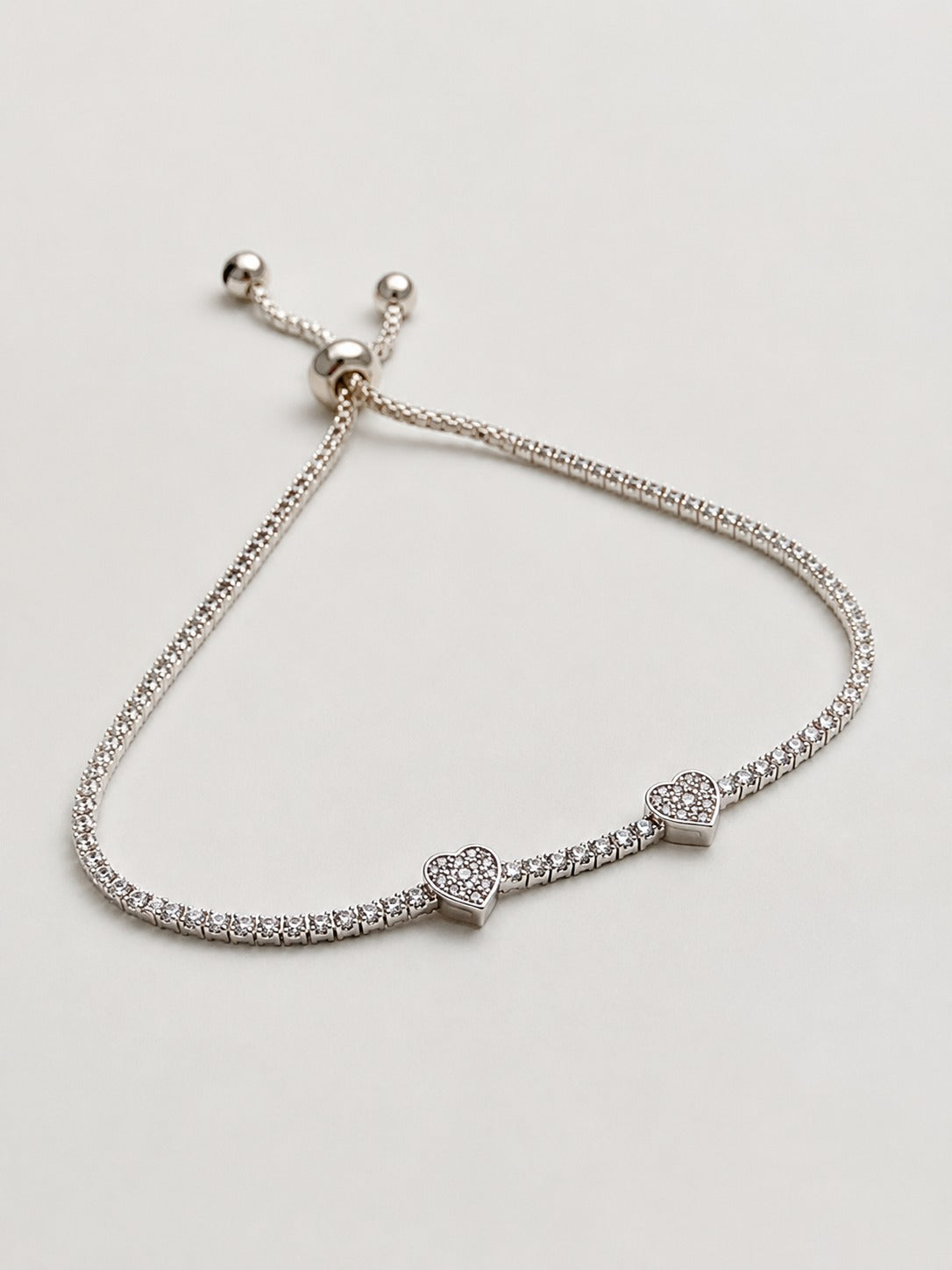 925 sterling silver heart bracelet with sparkling crystals and adjustable chain for women