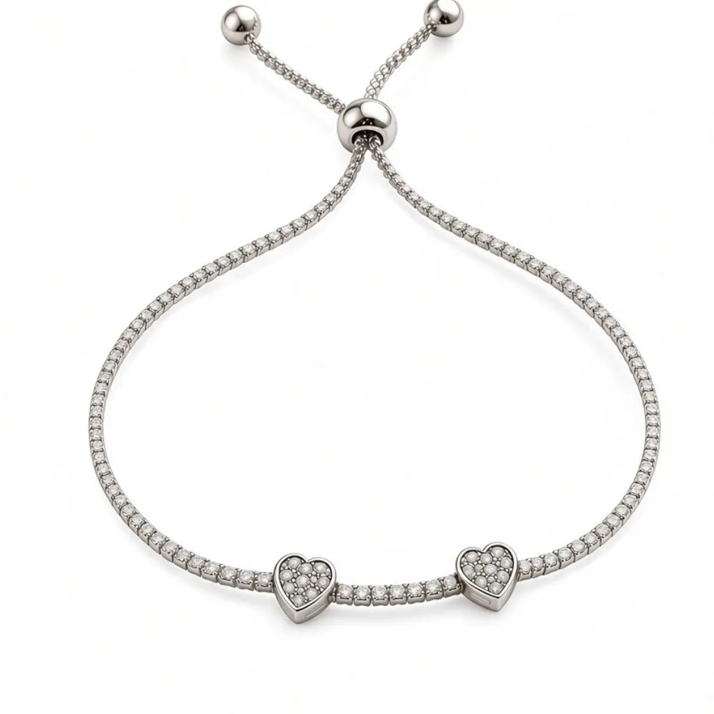 Adjustable heart tennis bracelet with sparkling cubic zirconia band and bolo slider ball ends, top view