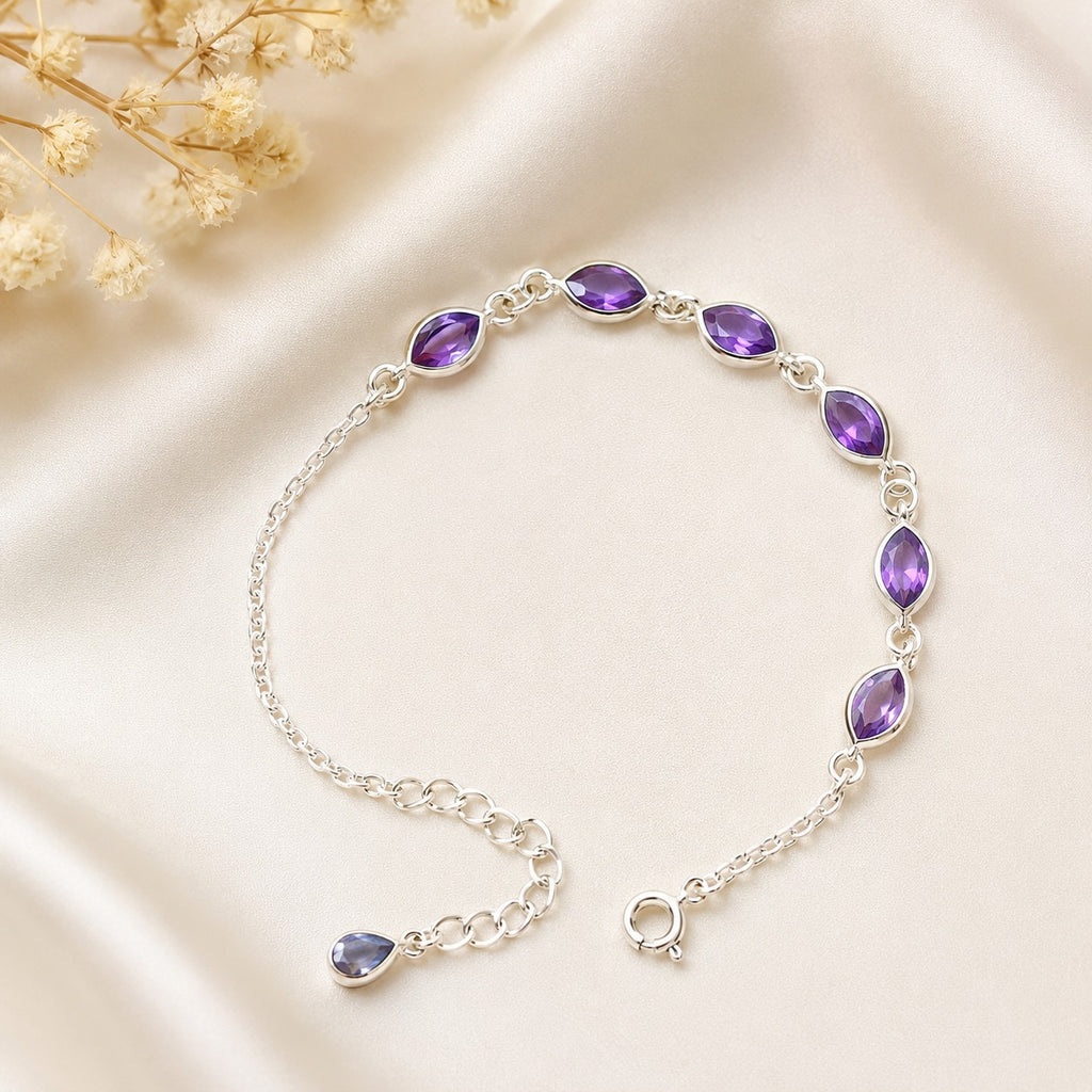 Adjustable sterling silver bracelet with purple marquise gemstones