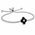 Adjustable sterling silver tennis bracelet with black clover charm and bolo slider ball ends