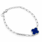 Beaded paperclip chain silver bracelet with blue lucky clover charm and secure lobster clasp, top view