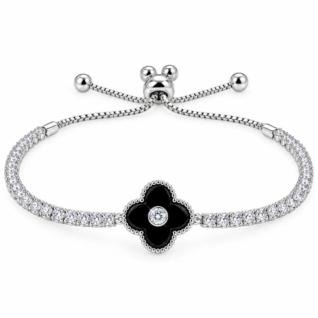 Black onyx four-leaf clover tennis bracelet in 925 sterling silver with adjustable slider clasp and cubic zirconia