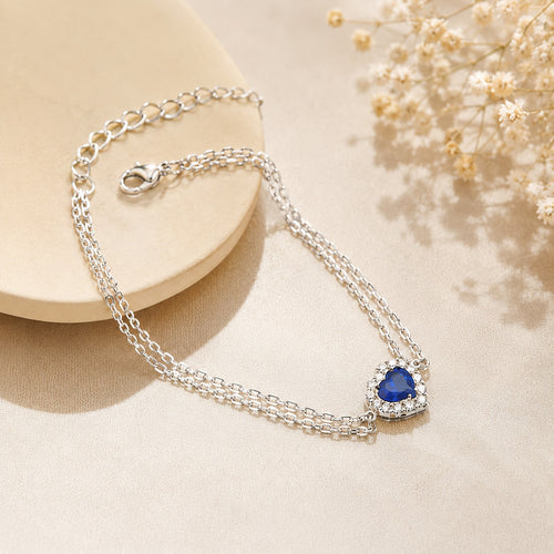 Elegant blue clover charm bracelet with sterling silver chain