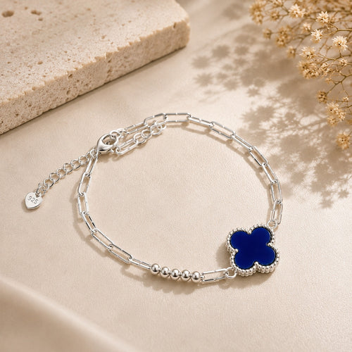 Elegant blue clover charm bracelet with sterling silver chain