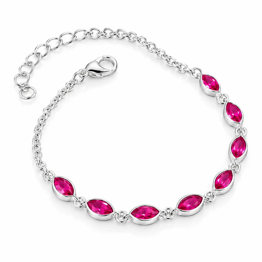 July birthstone ruby bracelet in silver with marquise-cut bezel-set stones and extender chain, angled view