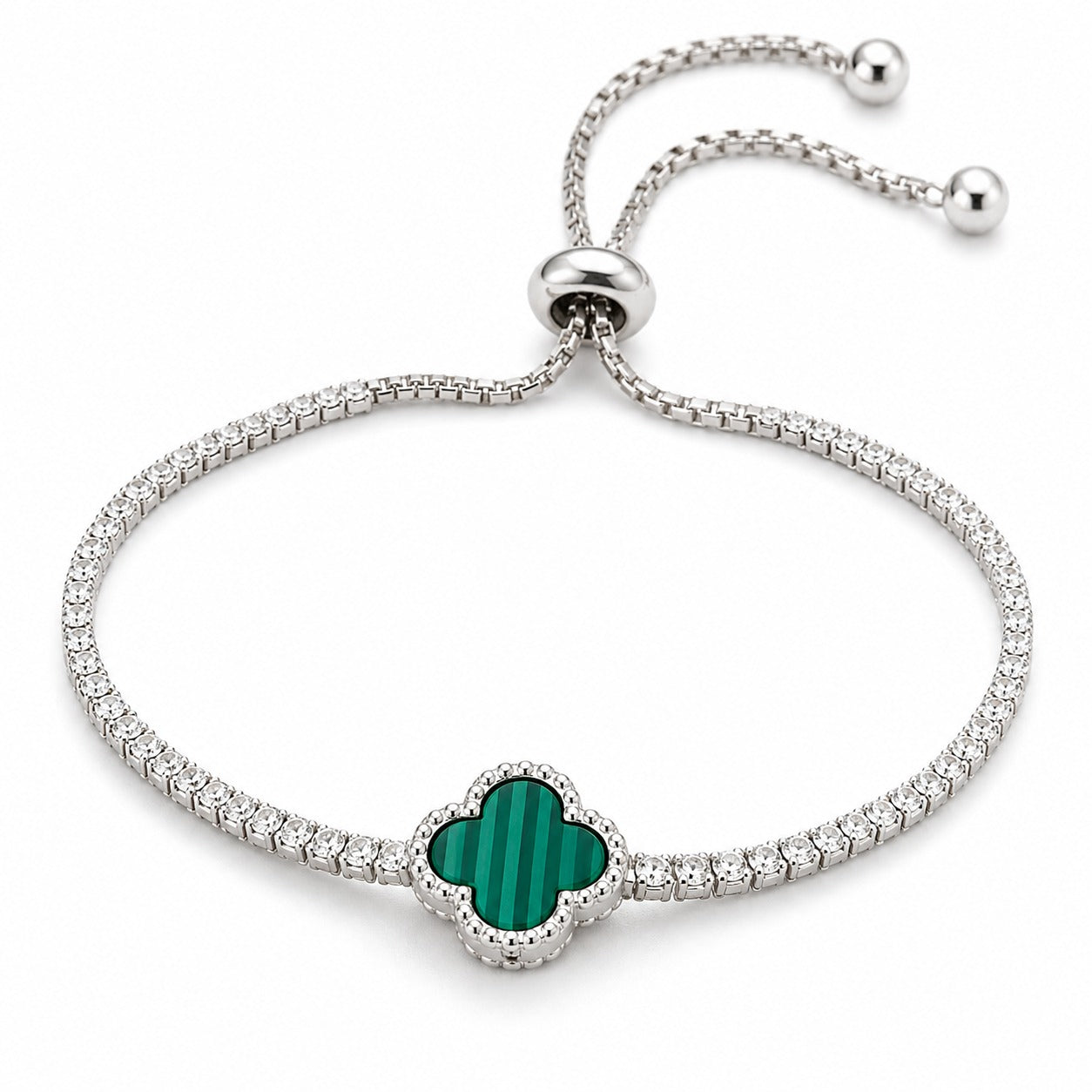 Close-up of green malachite clover charm set in 925 sterling silver with sparkling zircon accents.