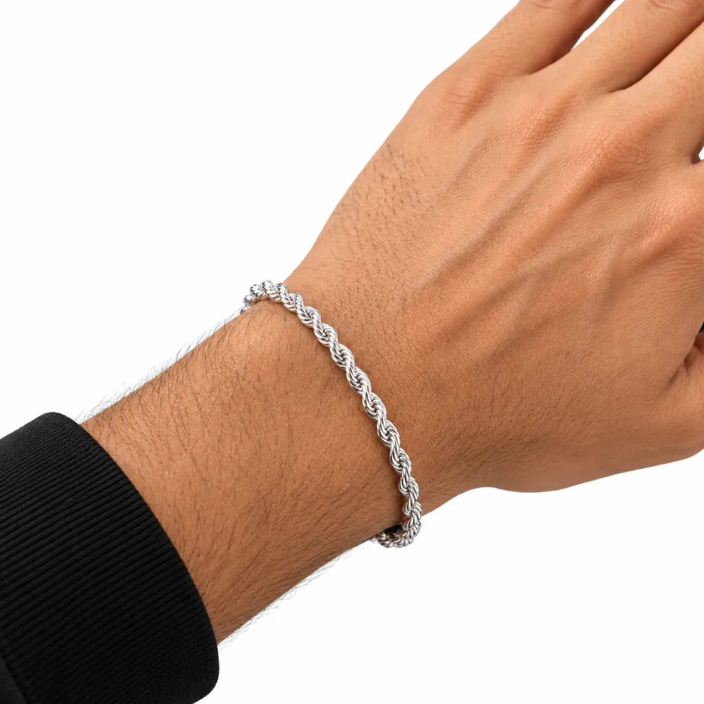 Man wearing 925 sterling silver rope chain bracelet on wrist with black sleeve
