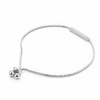 Minimalist silver slider bracelet with thin box chain, cubic zirconia bar and two ball ends, top view