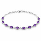 Purple marquise gemstone bracelet in sterling silver with bezel-set stones, spring ring clasp and extender chain with stone drop, shown open