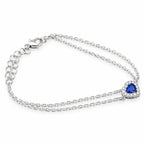 September birthstone blue heart bracelet in silver with cubic zirconia halo, double chain and lobster clasp, side view
