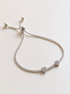 Elegant double heart sterling silver bracelet with sparkling crystal details