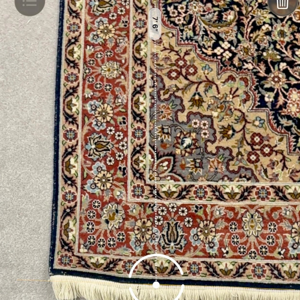 Vintage Tabriz-style Persian rug showing 6 feet 7 inches length measurement