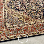 Vintage Tabriz-style Persian rug showing 4 feet 7 inches width measurement