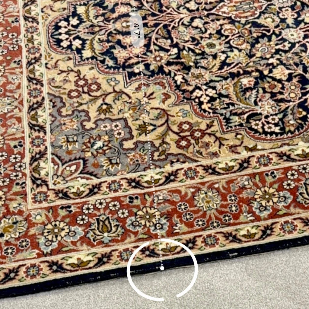 Vintage Tabriz-style Persian rug showing 4 feet 7 inches width measurement